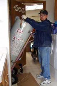 a tech delivers a new water heater